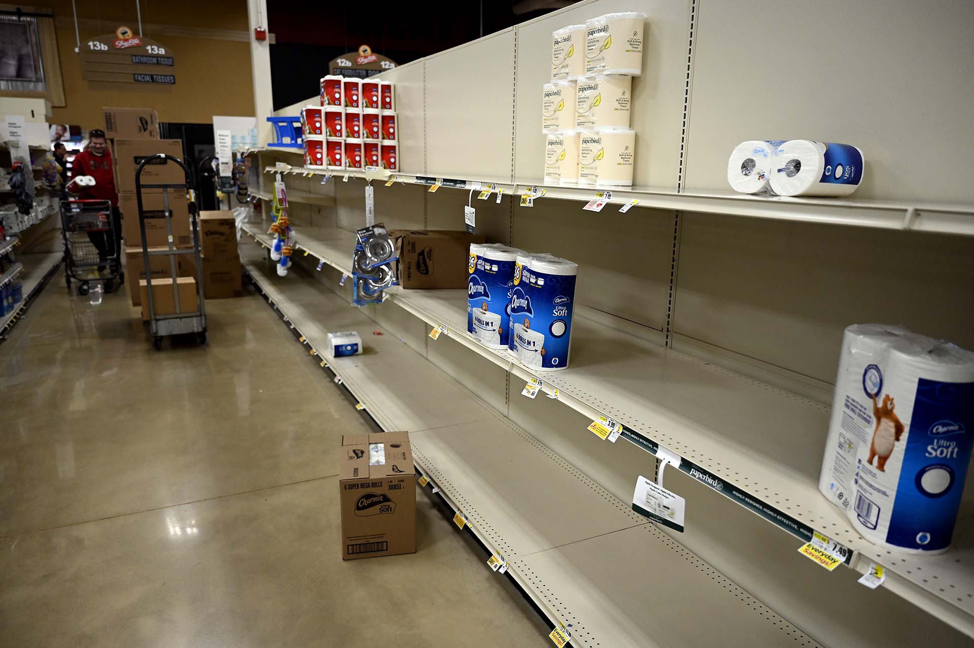 Nearly empty shelves of bathroom tissue is seen at ShopRite in Canton on March 13, 2020. Many Connecticut stores have seen shoppers stock up on supplies and food amid the coronavirus health crisis. (Joe Amon/Connecticut Public/NENC)