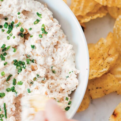 Four-Onion Dip recipe Excerpted from Onions Etcetera: The Essential Allium Cookbook by Kate Winslow and Guy Ambrosino. Copyright © 2017 by Kate Winslow and Guy Ambrosino. Published by Burgess Lea Press.