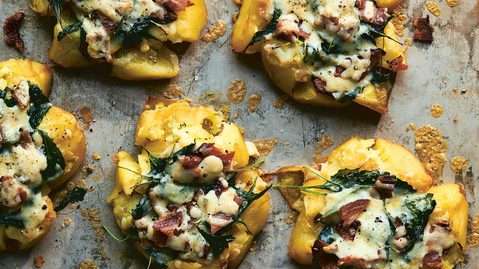 Smashed Potatoes with Bacon, Cheddar, and Greens