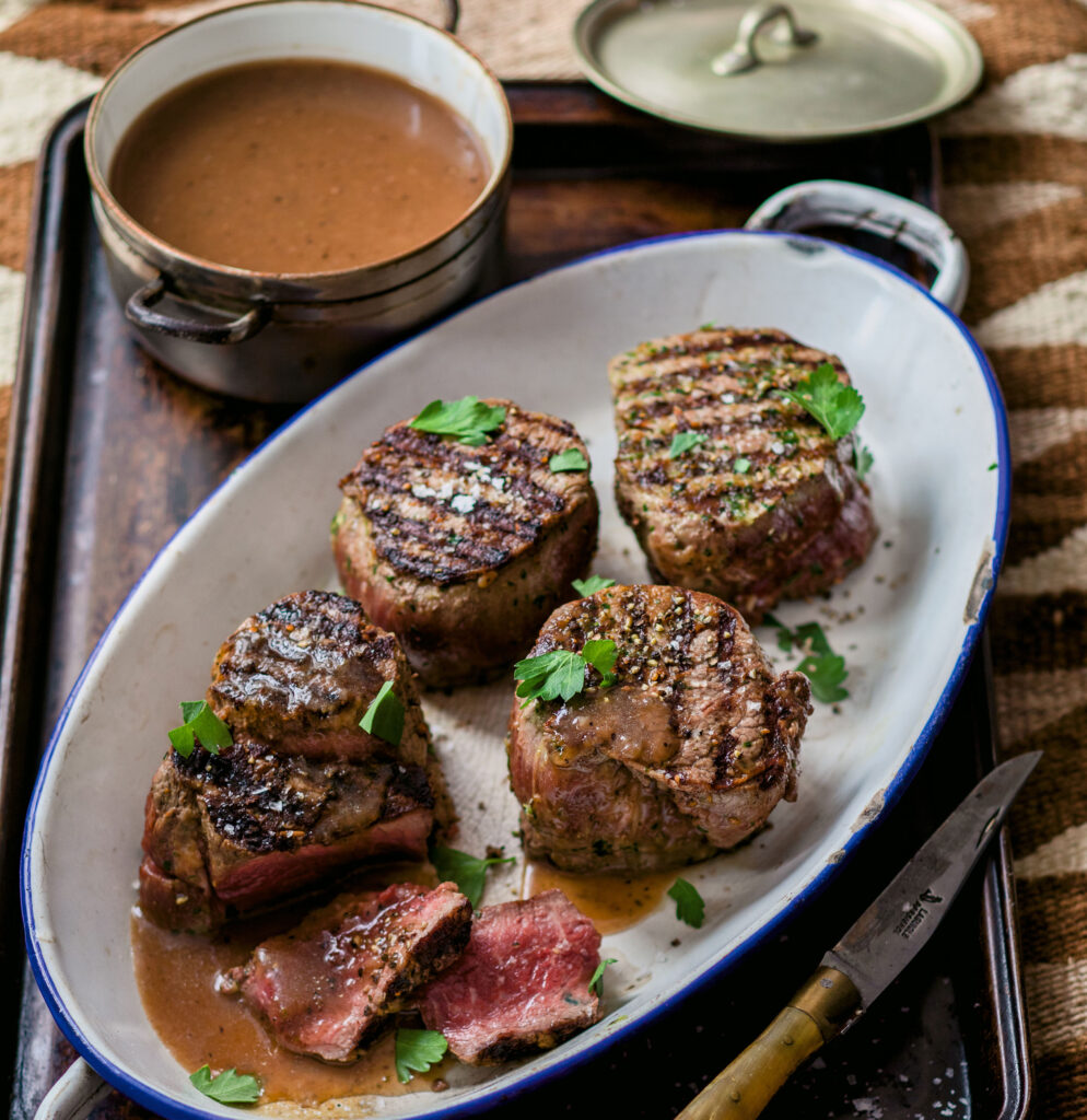 Grilled Beef Tenderloin with Juniper Sauce Recipe_Excerpted with permission from New Native Kitchen by Freddie Bitsoie and James O. Fraioli. Copyright © 2021 Freddie Bitsoie and James O. Fraioli. Published by Abrams, 2021. Photo copyright © 2021 Quentin Bacon.