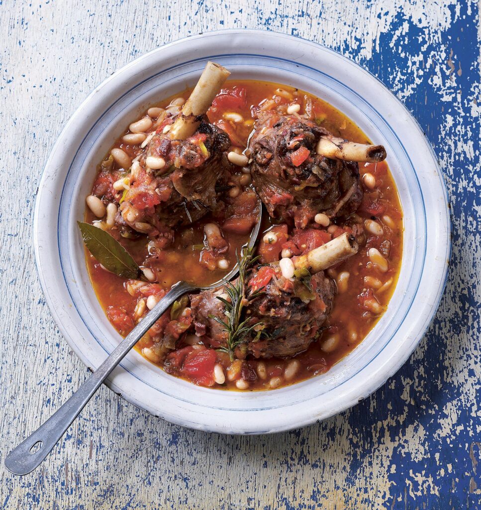 Lamb, Braised Shanks with Garlic, Rosemary and Cannellini Beans recipe. Excerpted with permission from Forgotten Skills of Cooking: 700 Recipes Showing You Why the Time-Honored Ways Are the Best by Darina Allen. © Darina Allen. Published by Kyle Books. Photographs © Peter Cassidy