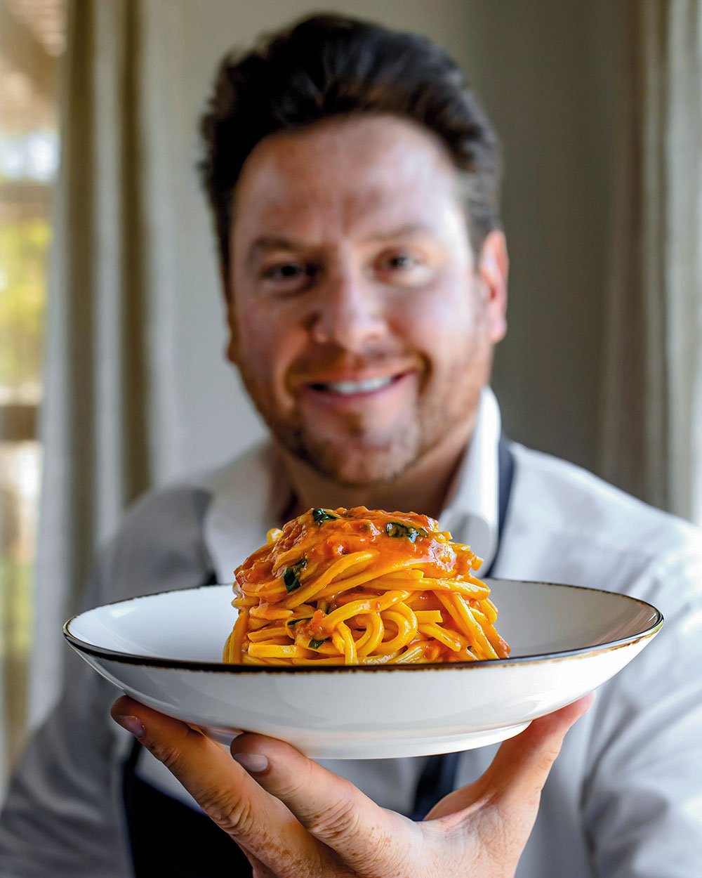 Pasta Pomodoro recipe. Reprinted with permission from Peace Love and Pasta by Scott Conant, © 2021 Scott Conant. Published by Abrams. Photographs © 2021 Ken Goodman.