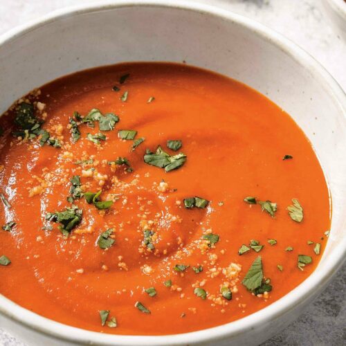 tomato and coconut soup recipe. Reprinted from Fix It With Food: Every Meal Easy” Copyright © 2021 by Michael Symon and Douglas Trattner. Photographs copyright © 2021 by Ed Anderson. Illustrations copyright © 2021 by Stanley Chow. Published by Clarkson Potter, an imprint of Random House.
