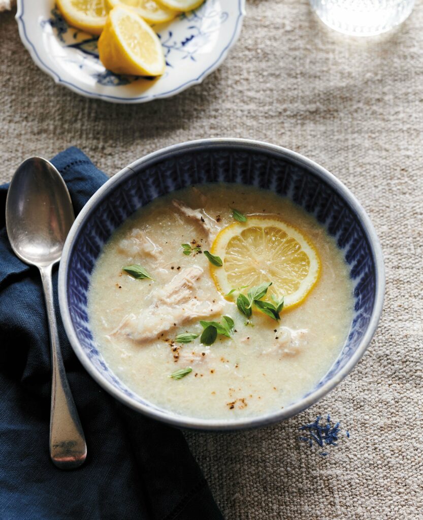 Avgolemono Greek Chicken Soup recipe. Excerpted from Preppy Kitchen. Copyright © 2022, John Kanell. Photography Copyright © 2022 By David Malosh. Reproduced by permission of Simon Element, an imprint of Simon & Schuster. All rights reserved.
