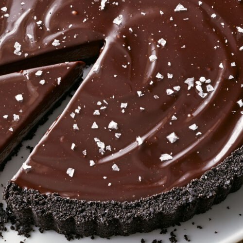 Dark Chocolate Tart recipe Excerpted from Go-To Dinners Copyright © 2022 by Ina Garten. Photographs copyright © 2022 by Quentin Bacon. Published by Clarkson Potter, an imprint of Random House.