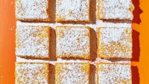 Lemon Bars recipe from Sugar High: 50 Recipes for Cannabis Desserts by Chris Sayegh. Copyright © 2022, Chris Sayegh. Photography Copyright © 2022 By Blue Line Creative Group LLC. Reproduced by permission of Simon Element, an imprint of Simon & Schuster. All rights reserved.