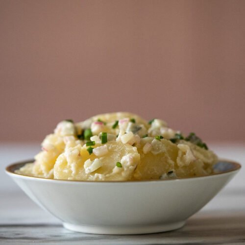 helgas potato salad recipe. Excerpted from MY VERMONT TABLE: Recipes for all (Six) Seasons by Gesine Bullock-Prado Copyright © 2023. Used with permission of the publisher, Countryman Press. All rights reserved. Photo by Raymond Prado.