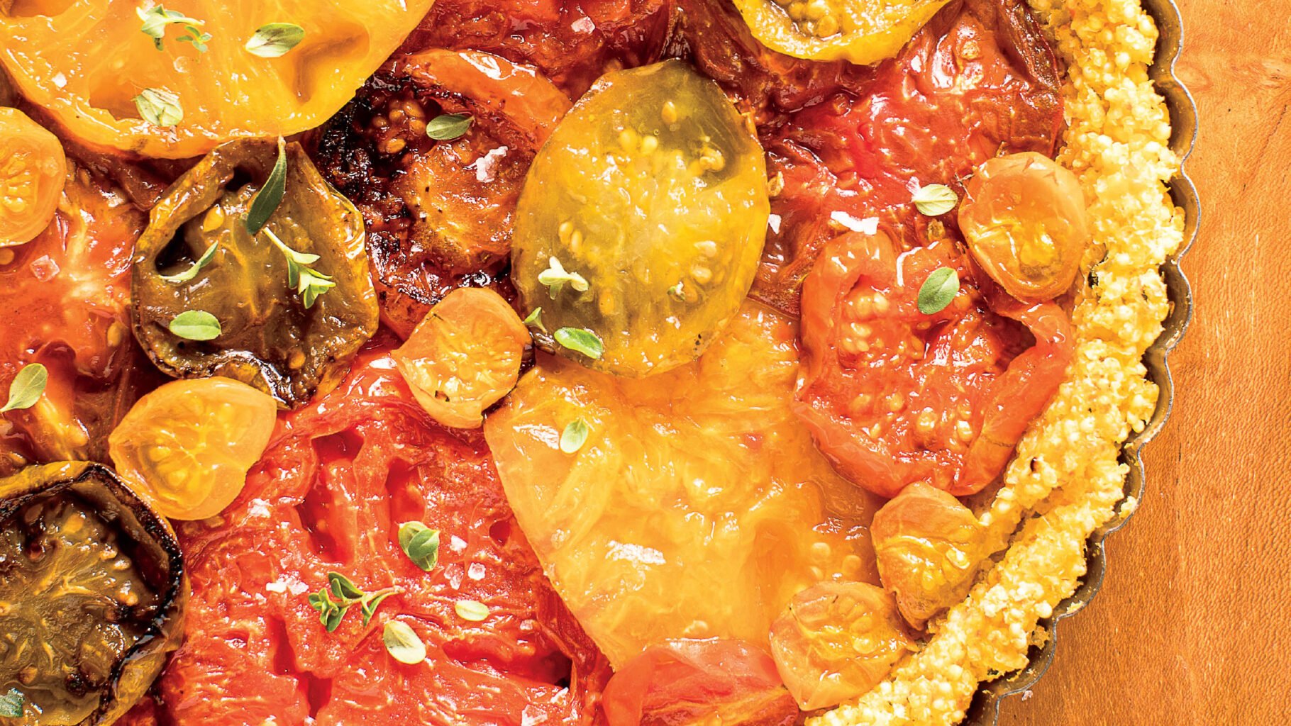 Roasted Heirloom Tomato and Millet Tart recipe Excerpted from Nourish: Plant-Based Recipes To Feed Body Mind And Soul by Terry Walters