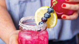 Blueberry Lemonade Margaritas recipe excerpted from Delish Ultimate Cocktails by Joanna Saltz & the editors of Delish