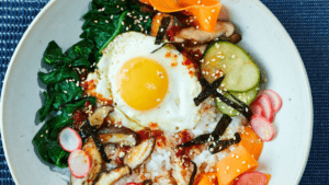Bibimbap with Pickled Vegetables excerpted from The Simple Art of Rice by JJ Johnson with Danica Novgorodoff.