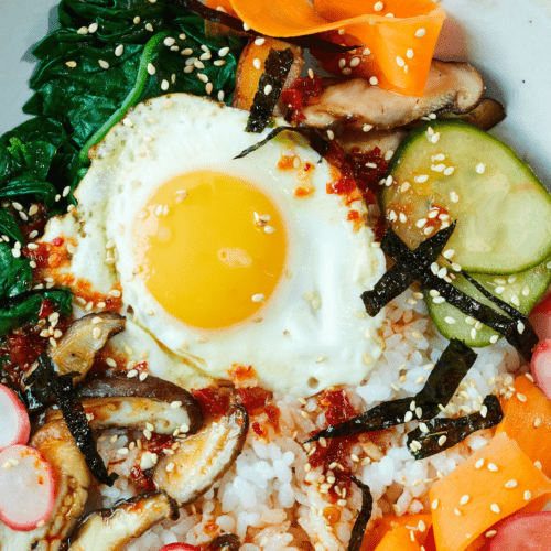 Bibimbap with Pickled Vegetables excerpted from The Simple Art of Rice by JJ Johnson with Danica Novgorodoff.