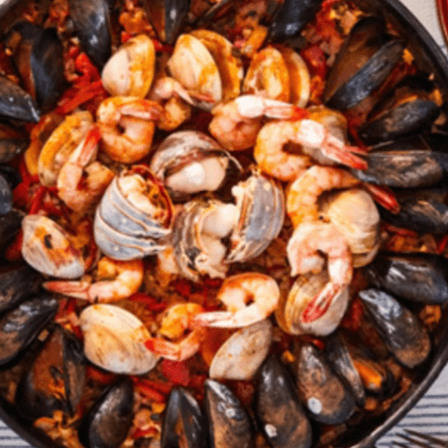 Seafood Paella excerpted from The Simple Art of Rice by JJ Johnson with Danica Novgorodoff.
