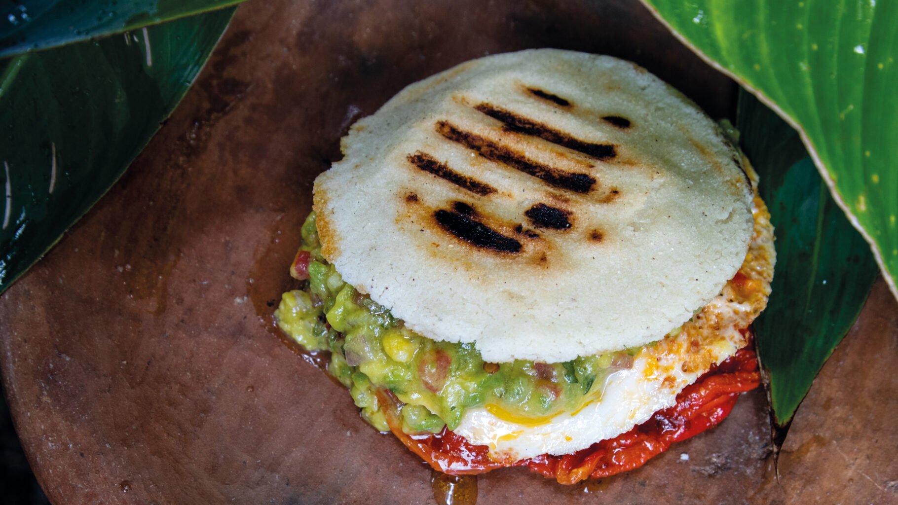 Huevos Rancheros Arepa excerpted from Arepa: Classic and Contemporary recipes for Venezuela’s Daily Bread by Irena Stein.