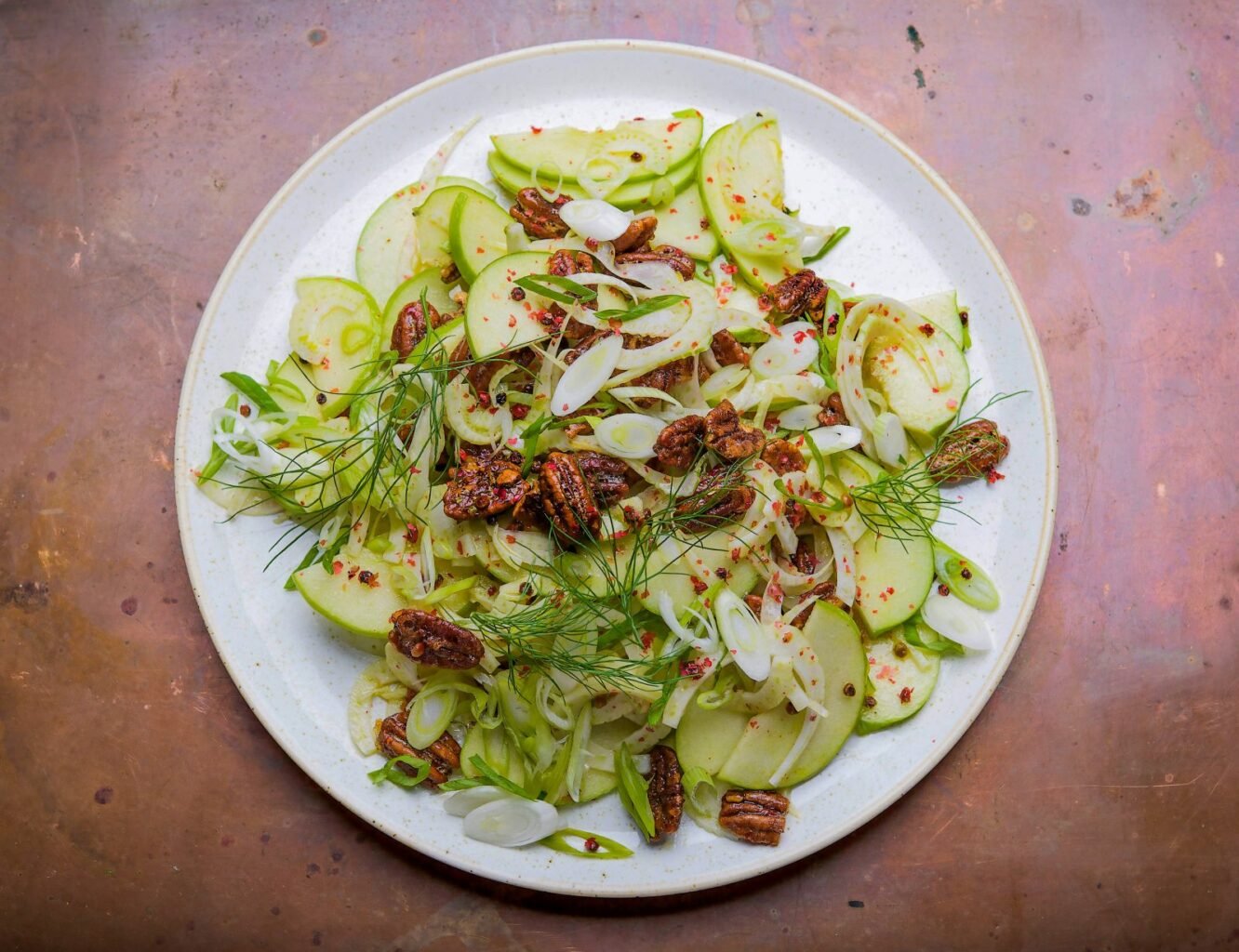 Apple-Fennel Salad with Candied Pecans by Christopher Kimball's Milk Street. © 2018 Christopher Kimball’s Milk Street. All Rights Reserved.