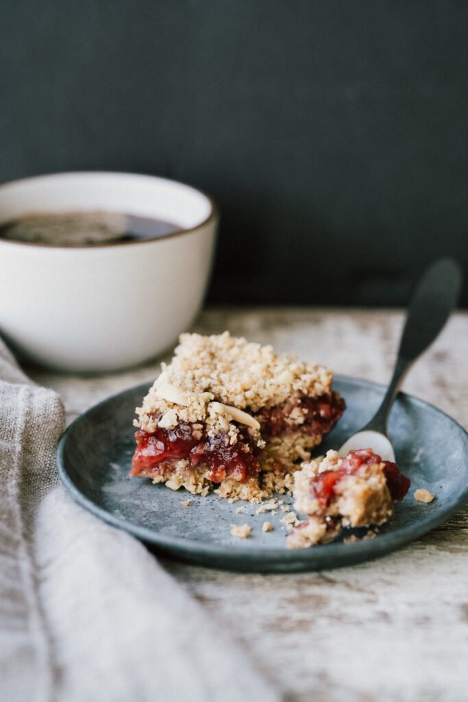 Strawberry Rhubarb Crumble Bars excerpted from Around Our Table by Sara Forte.